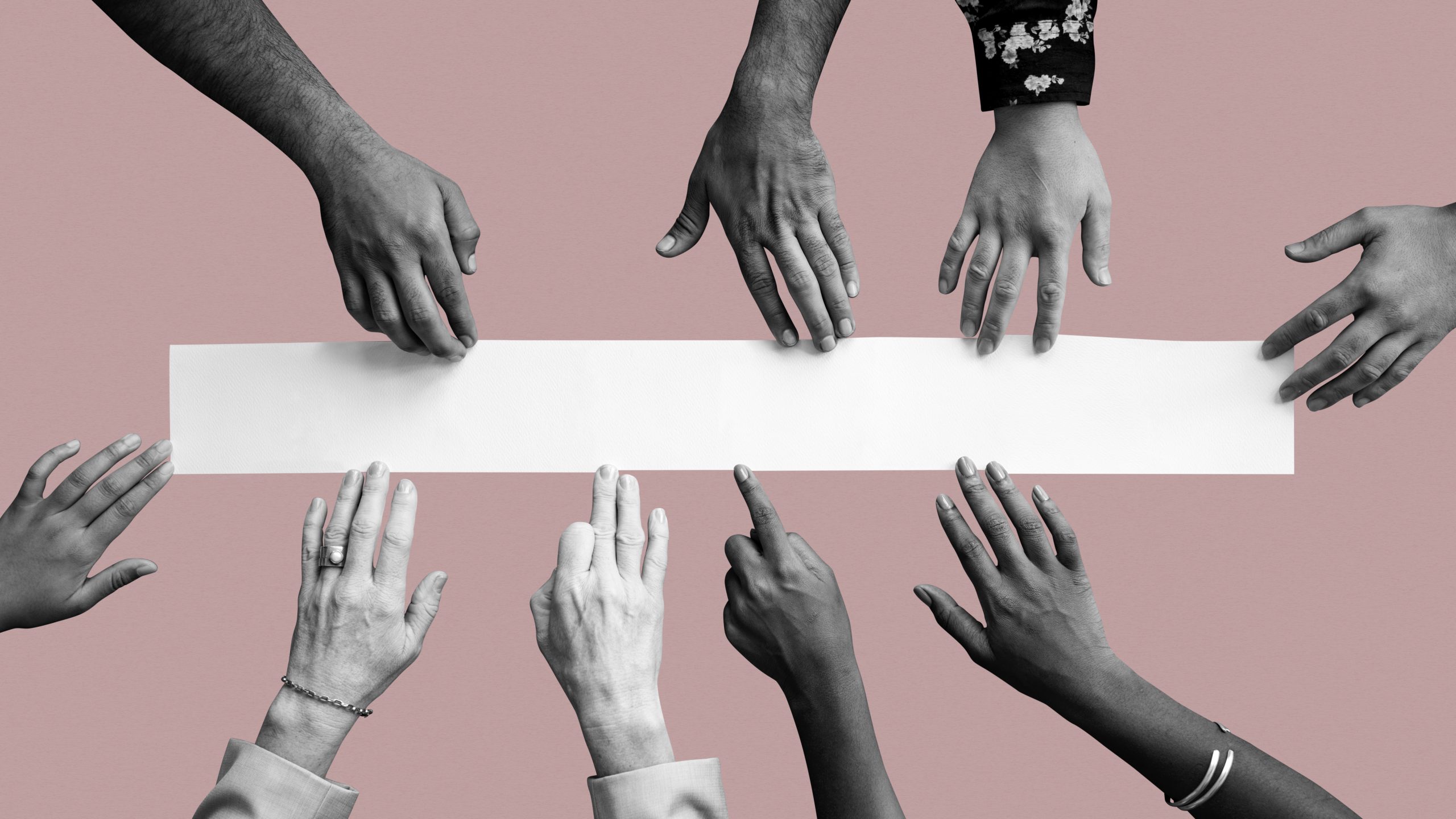 Diverse hands touching white paper mockup pink wallpaper diversidade